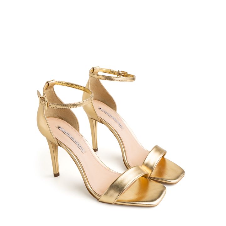 57032-0-sandalia-metalizada-ouro-salto-alto-fivela