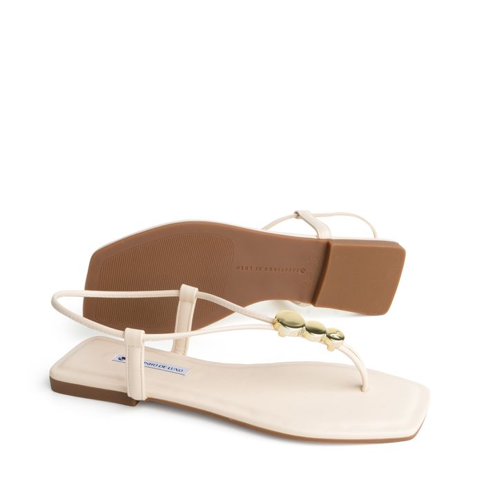 57360-1-rasteira-sandalia-nude-manteiga-regulagem-enfeite-ou