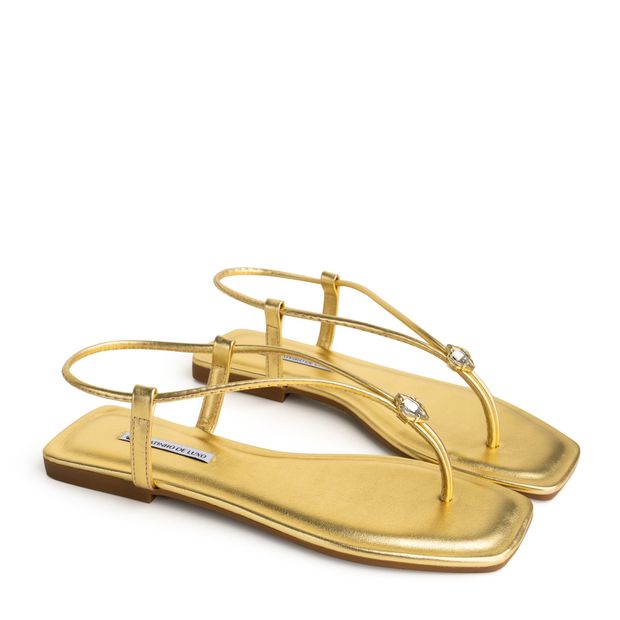 57853-0-rasteira-sandalia-metalizada-ouro-com-enfeite-pedra-