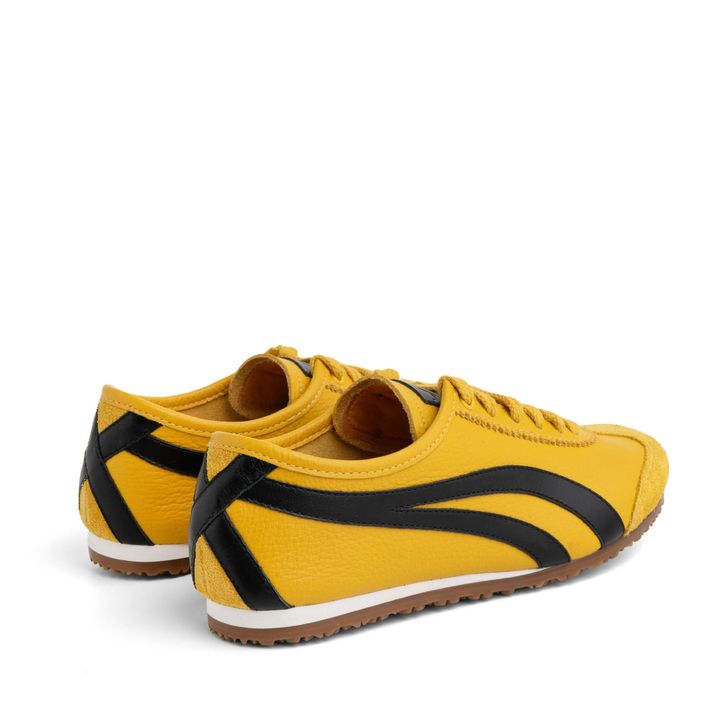 KANSAI_3-Tenis-Amarelo-Sola-Baixa-Tiras-laterais-Preto-3.jpg