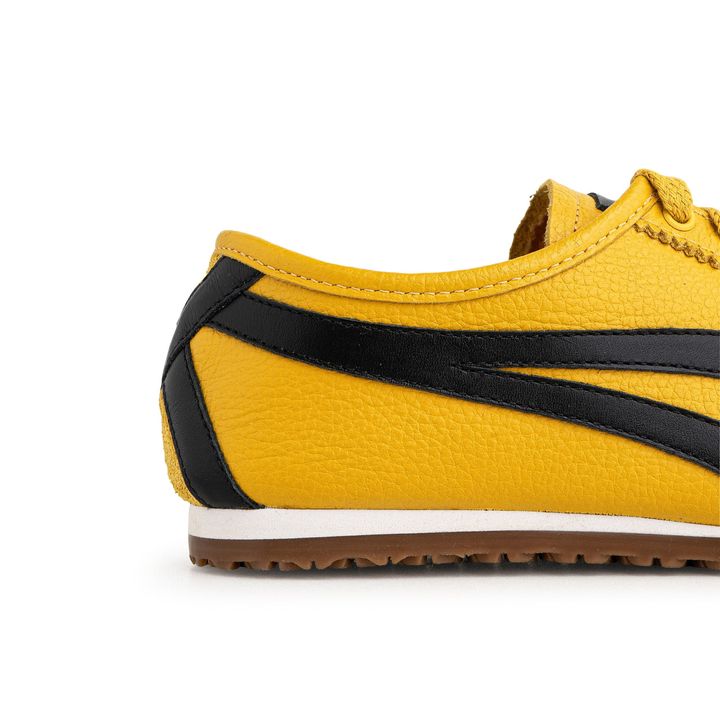 KANSAI_3-Tenis-Amarelo-Sola-Baixa-Tiras-laterais-Preto-6.jpg