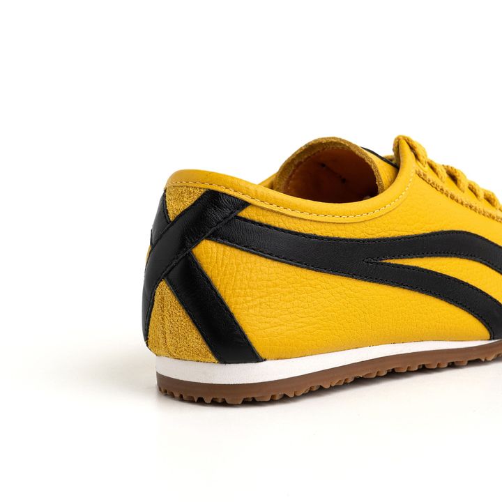 KANSAI_3-Tenis-Amarelo-Sola-Baixa-Tiras-laterais-Preto-8.jpg